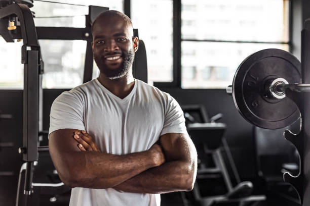 istock Sporty african man resting, having break after doing exercise. 1439672382