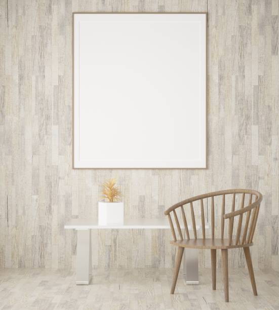 istock Picture frame attached to the wall, with chairs and vases placed on the table. 1439675904