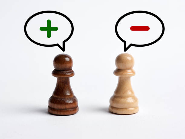 istock Dispute or discussion between two people about the pros and cons. Positive and negative mindset. Pessimistic and optimistic. 1439678000