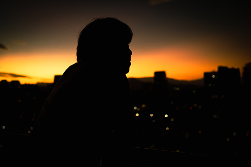 Man in a dusk sunset
