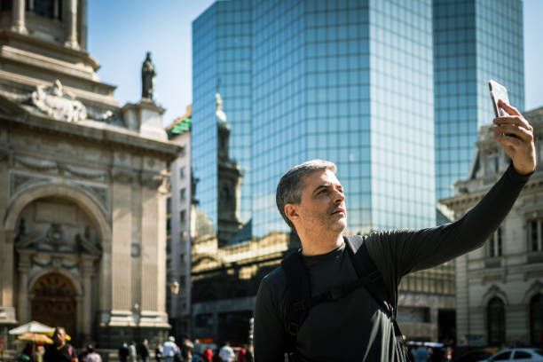 istock Man taking a selfie Chilean urban environment 1439678777