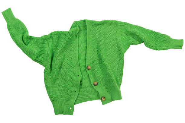 istock Green knitted sweater with buttons, laid out as if levitating on a white background 1439679192