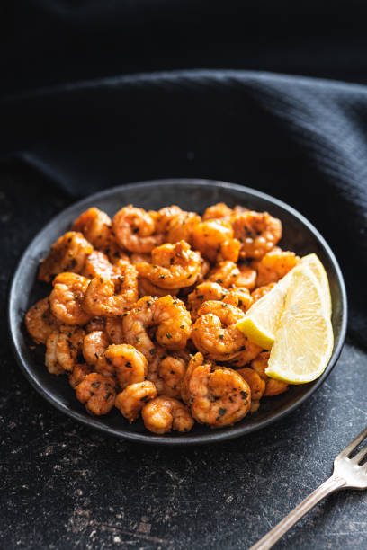 istock Grilled tiger shrimps on plate. 1439681724