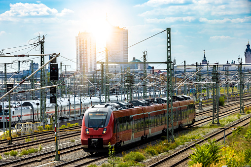 Train in Leipzig, with the Skyline in the background