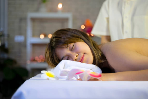 Customer and employee are at spa and resort. Leisure activity, relaxation and vacation concept.