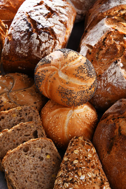istock Assorted bakery products including loafs of bread and rolls 1439693511