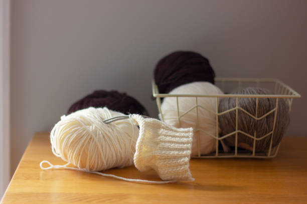 istock skeins and knitting needles . yarn, hobby, leisure, needlework 1439704711