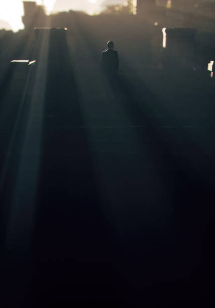 istock Man in suit walks at an ancient misty ruin. 3D render. 1439704938