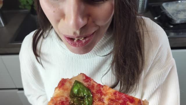 a bite of pizza