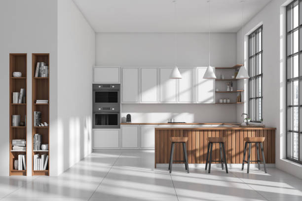istock Front view on bright kitchen room interior with island, windows 1439705463