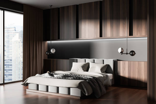 istock Wooden bedroom interior with bed and nightstand, panoramic window 1439707075