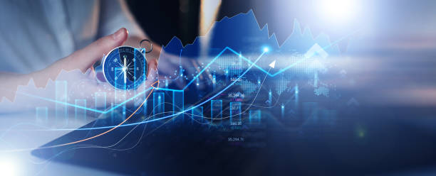 istock Business person using navigation compass with digital graphics for the right direction and successful business with growing revenue.  Investment of growth on currency rate and business strategy plan. 1439708263