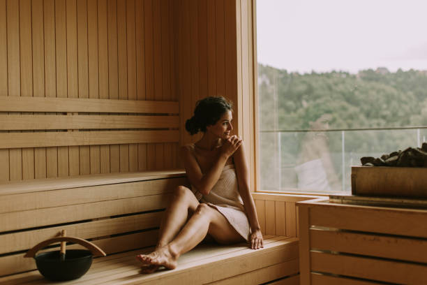 istock Young woman relaxing in the sauna 1439708666
