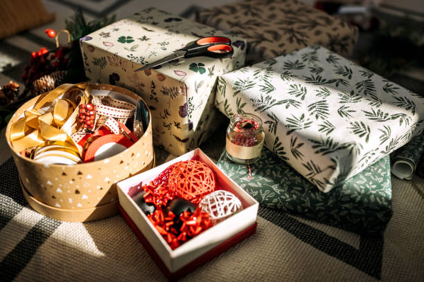 istock Wrapped gifts and wrapping materials with no people 1439710548