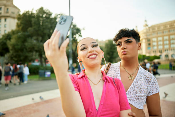Young people having fun as they pose for selfie in Barcelona