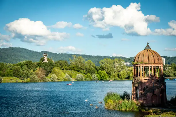 Colorful panorama of the Flueckiger lake in the lake park in Freiburg