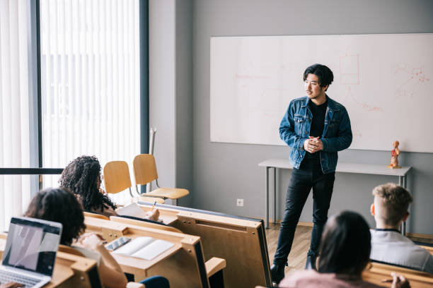 istock Group of students attending university seminar 1439722432