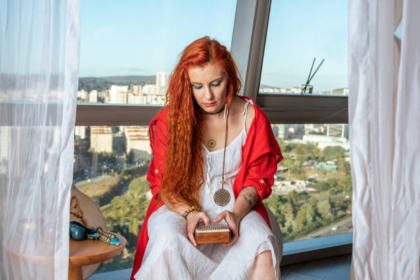 Shaman woman playing kalimba