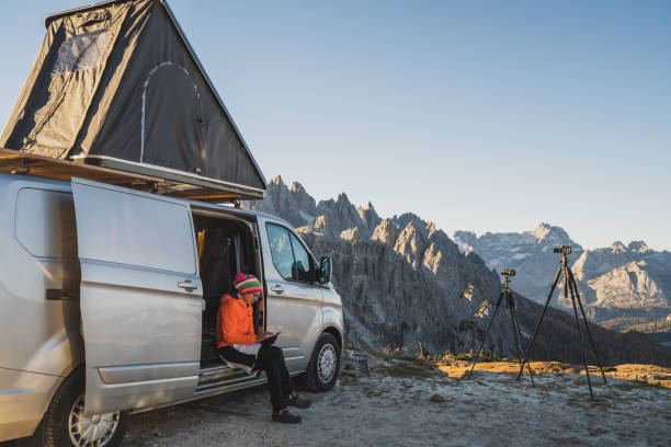 istock Woman during adventure camping journey in dolomite mountains 1439728713