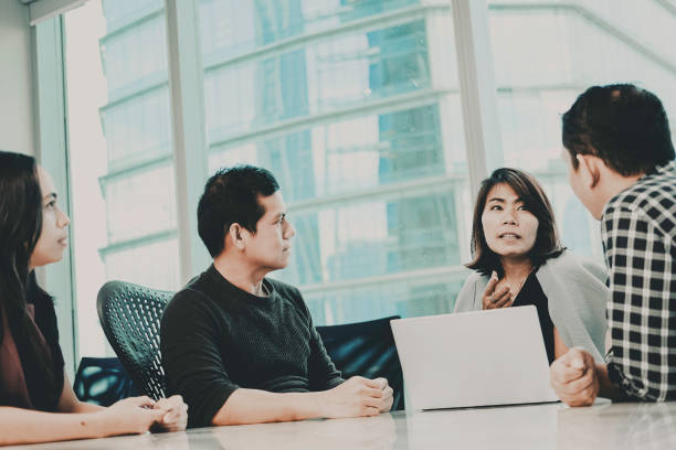 istock Business people having a meeting in office 1439729007