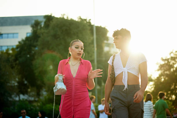 istock Young people walking together in Barcelona at dusk 1439731297