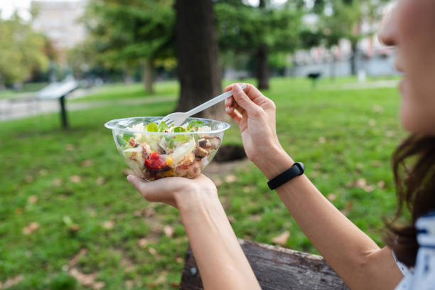 istock Unrecognizable woman is ready to eat her fresh salad 1439732430