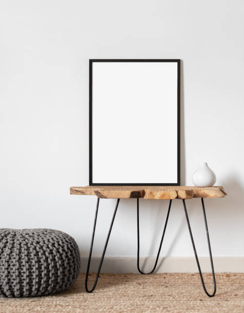 istock Artwork mockup in interior design. Blank picture frame on a wall 1439737558