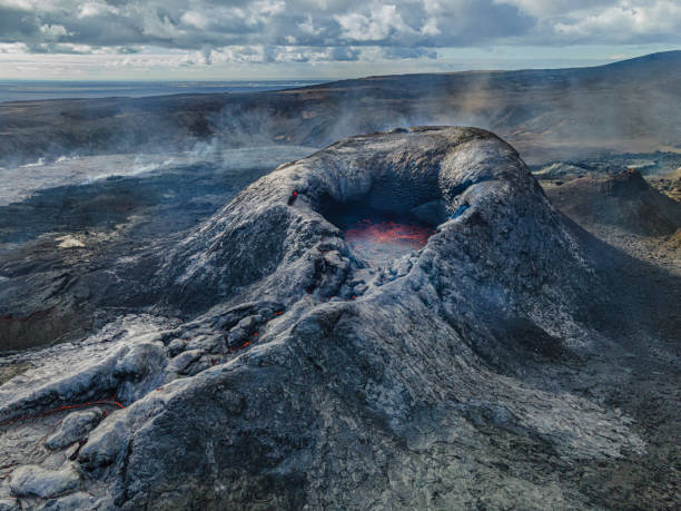 istock Volcanic crater during the day with sunshine 1439744703
