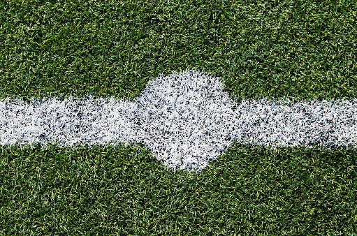 Artificial soccer green turf with white line