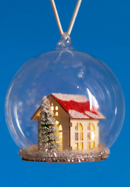 istock Close up glass Christmas tree bauble with light 1439754157