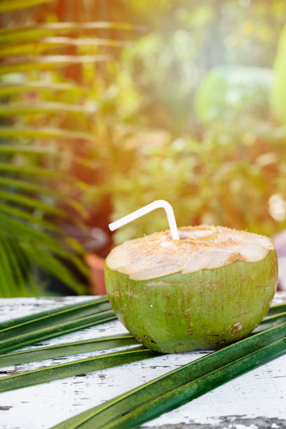 istock coconut juice . Fresh coconut water, young coconut drink . 1439754204
