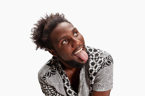 Portrait of afro men tongue out