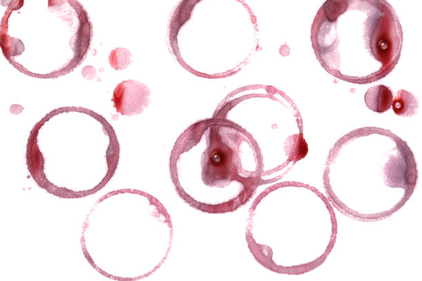 istock Red wine rings and drops on white background, top view 1439757234