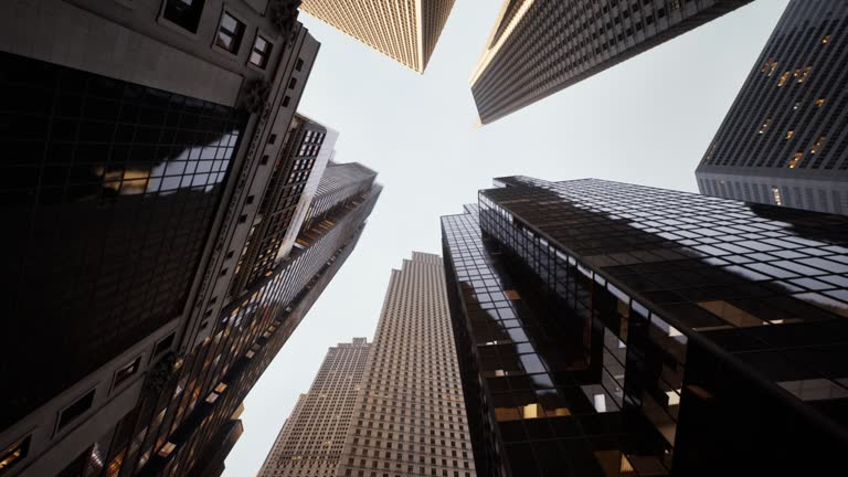 Looking Up Manhattan Skyscrappers With skies