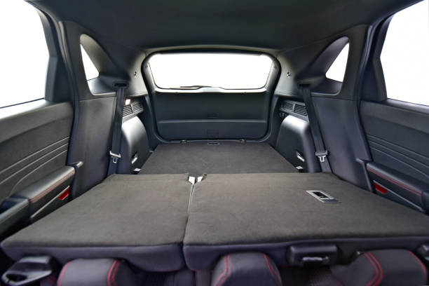 istock Trunk of car with rear seats folded, inside view 1439761549