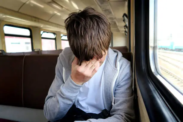 Sad Man in the Electric Train