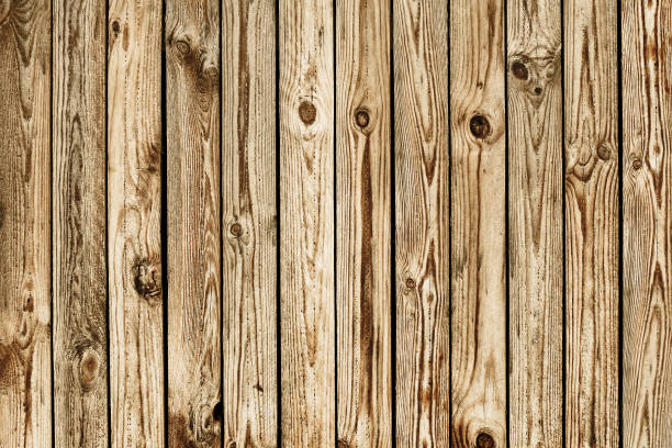 istock Brown wood texture. Wooden desk background. Knots pattern. Wood background. Natural rustic hardwood board texture. Grunge old weathered tree knot surface. 1439762101