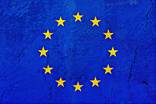 Flag of the European Union, on a cracked rough sandstone surface