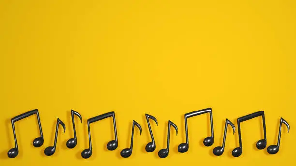 Black music notes on yellow background. Modern design for music event or festival. 3D rendered image