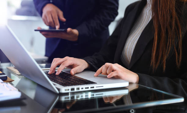 istock Business team meeting present.professional investor working with  Finance managers task. withlaptop smart phone and digital tablet 1439763576
