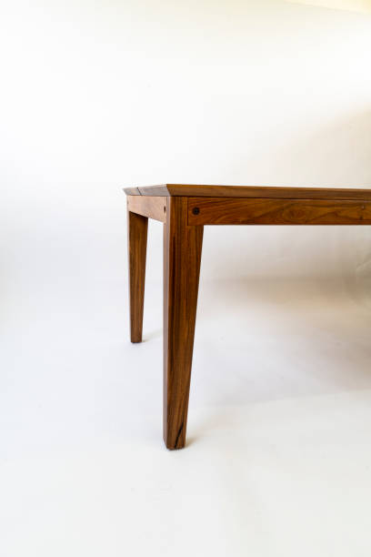 istock designer wood dining table, minimalist and simple objects on the table, mexico 1439764248