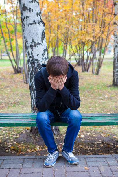 istock Sad Young Man outdoor 1439766139