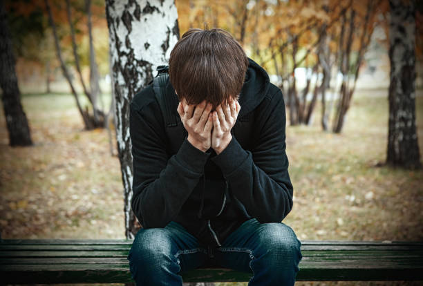 istock Sad Young Man outdoor 1439766184