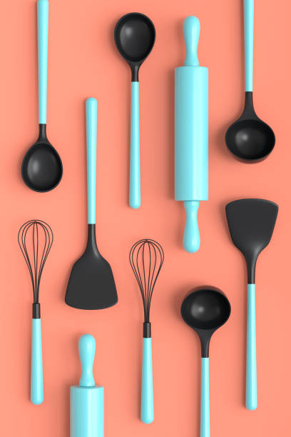 istock Wooden kitchen utensils, tools and equipment on coral background. 1439766338