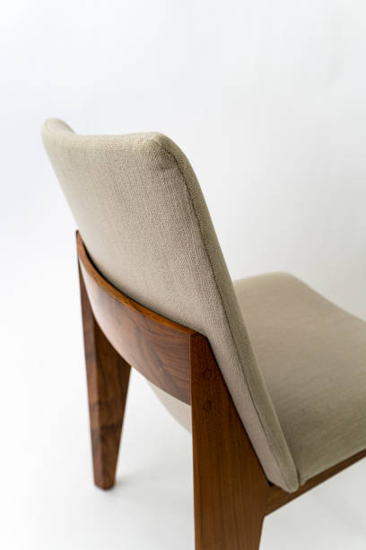istock modern wooden chair with fabric on white background, mexico 1439766788