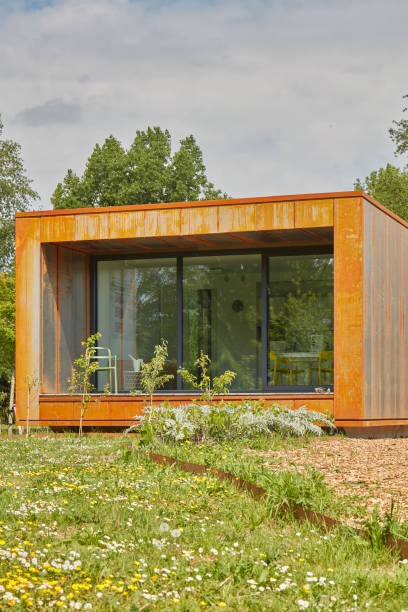 Almere, The Netherlands - May 17, 2022: Contemporary designed new corten steel tiny house on the Floriade expo in Almere, The Netherlands