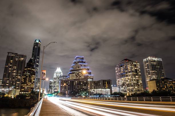 istock Long exposure of a bridge leading to Downtown Austin, Texas 1439770537