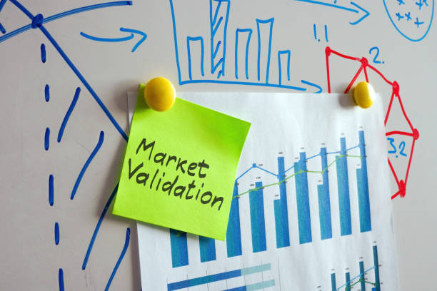 istock Whiteboard with charts and sticker market validation. 1439771648