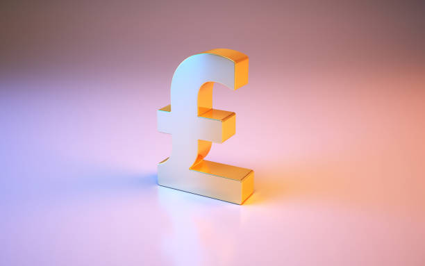 istock Pound Symbol Sitting on Metallic Blue and Pink Background 1439772423