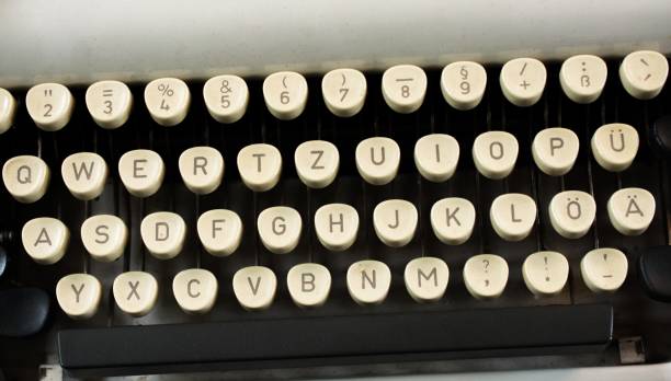 istock High angle shot of an antique typewriter on a white surface 1439773294